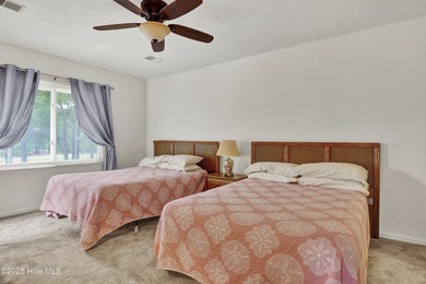 Nestled in the heart of Sunset Beach, this beautifully furnished on Oyster Bay Golf Links in North Carolina - for sale on GolfHomes.com, golf home, golf lot