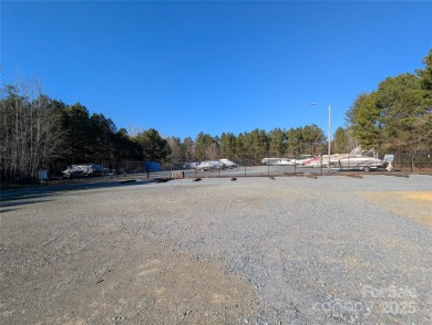 Beautiful cul-de-sac lot in the gated community of Heron Bay on Old North State Club at Uwharrie Point Golf community in North Carolina - for sale on GolfHomes.com, golf home, golf lot