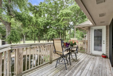 Nestled in the heart of Sunset Beach, this beautifully furnished on Oyster Bay Golf Links in North Carolina - for sale on GolfHomes.com, golf home, golf lot
