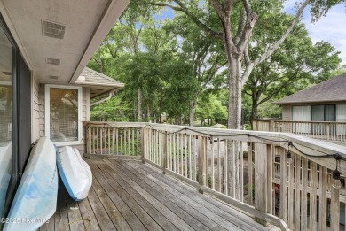 Nestled in the heart of Sunset Beach, this beautifully furnished on Oyster Bay Golf Links in North Carolina - for sale on GolfHomes.com, golf home, golf lot
