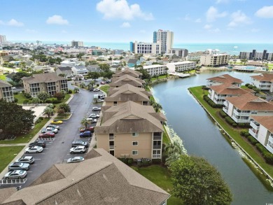 Discover your perfect coastal escape in this wonderful, fully on Surf Golf and Beach Club in South Carolina - for sale on GolfHomes.com, golf home, golf lot