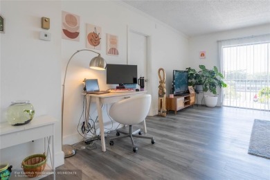 Discover the perfect blend of comfort and convenience in this on Oriole Golf and Tennis Club in Florida - for sale on GolfHomes.com, golf home, golf lot