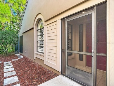 Palm Harbor - Nestled in the gated community of Wescott Square on Tarpon Woods Golf Club in Florida - for sale on GolfHomes.com, golf home, golf lot