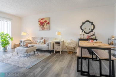 Discover the perfect blend of comfort and convenience in this on Oriole Golf and Tennis Club in Florida - for sale on GolfHomes.com, golf home, golf lot
