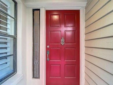 Palm Harbor - Nestled in the gated community of Wescott Square on Tarpon Woods Golf Club in Florida - for sale on GolfHomes.com, golf home, golf lot