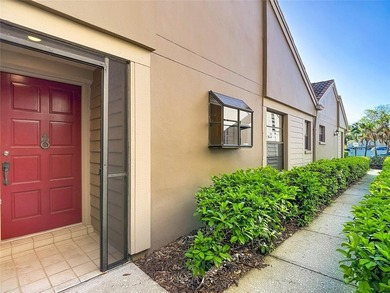 Palm Harbor - Nestled in the gated community of Wescott Square on Tarpon Woods Golf Club in Florida - for sale on GolfHomes.com, golf home, golf lot