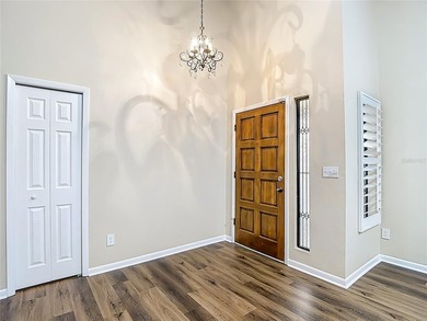 Palm Harbor - Nestled in the gated community of Wescott Square on Tarpon Woods Golf Club in Florida - for sale on GolfHomes.com, golf home, golf lot