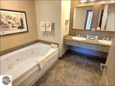 If you're searching for a base camp with stunning views and on  in Michigan - for sale on GolfHomes.com, golf home, golf lot