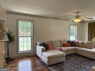 Enjoy life in this beautiful all-brick, low maintenance home in on Jennings Mill Country Club in Georgia - for sale on GolfHomes.com, golf home, golf lot