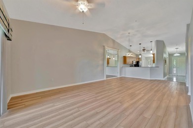 One or more photo(s) was virtually staged. Experience on Heritage Oaks Golf and Country Club in Florida - for sale on GolfHomes.com, golf home, golf lot