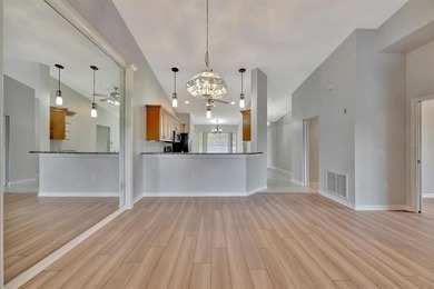 One or more photo(s) was virtually staged. Experience on Heritage Oaks Golf and Country Club in Florida - for sale on GolfHomes.com, golf home, golf lot