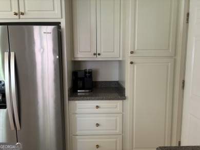 Enjoy life in this beautiful all-brick, low maintenance home in on Jennings Mill Country Club in Georgia - for sale on GolfHomes.com, golf home, golf lot