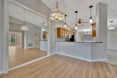 One or more photo(s) was virtually staged. Experience on Heritage Oaks Golf and Country Club in Florida - for sale on GolfHomes.com, golf home, golf lot