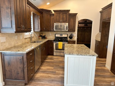 Welcome to this beautifully updated 7-bedroom, 3-bath rambler in on Glen Eagle Golf Course in Utah - for sale on GolfHomes.com, golf home, golf lot