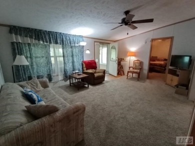 Discover this affordable 3-bedroom gem in the heart of Sugar on Lakeside Golf Course in Michigan - for sale on GolfHomes.com, golf home, golf lot