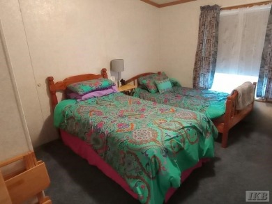 Discover this affordable 3-bedroom gem in the heart of Sugar on Lakeside Golf Course in Michigan - for sale on GolfHomes.com, golf home, golf lot