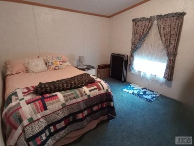 Discover this affordable 3-bedroom gem in the heart of Sugar on Lakeside Golf Course in Michigan - for sale on GolfHomes.com, golf home, golf lot