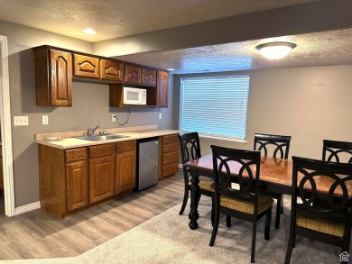 Welcome to this beautifully updated 7-bedroom, 3-bath rambler in on Glen Eagle Golf Course in Utah - for sale on GolfHomes.com, golf home, golf lot