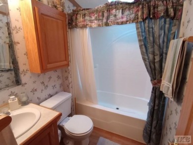 Discover this affordable 3-bedroom gem in the heart of Sugar on Lakeside Golf Course in Michigan - for sale on GolfHomes.com, golf home, golf lot