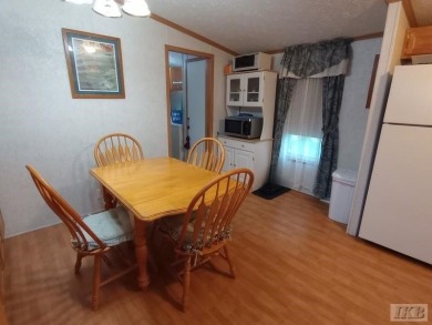 Discover this affordable 3-bedroom gem in the heart of Sugar on Lakeside Golf Course in Michigan - for sale on GolfHomes.com, golf home, golf lot