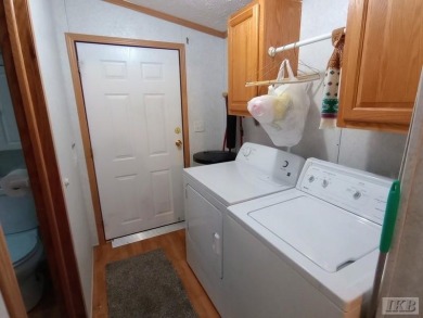 Discover this affordable 3-bedroom gem in the heart of Sugar on Lakeside Golf Course in Michigan - for sale on GolfHomes.com, golf home, golf lot