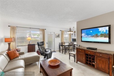 BEAUTIFULLY REMODELED, FIRST FLOOR 2 BEDROOM, 1.5 BATH CONDO on Hillsboro Pines Golf in Florida - for sale on GolfHomes.com, golf home, golf lot