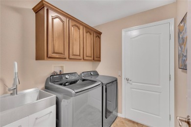 Welcome to this meticulously maintained home located in the on Heritage Harbor Golf and Country Club in Florida - for sale on GolfHomes.com, golf home, golf lot