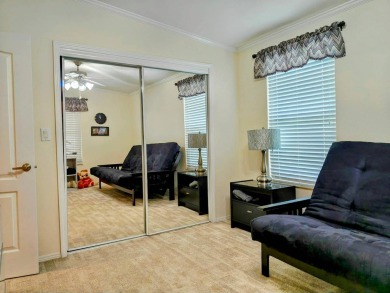 THIS IS A 2005 PALM HARBOR TRIPLE WIDE WITH OVER 1400 FEET OF on Southport Springs Golf Club in Florida - for sale on GolfHomes.com, golf home, golf lot