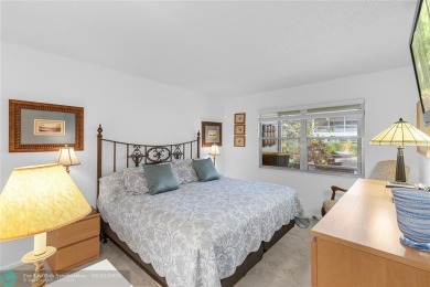 BEAUTIFULLY REMODELED, FIRST FLOOR 2 BEDROOM, 1.5 BATH CONDO on Hillsboro Pines Golf in Florida - for sale on GolfHomes.com, golf home, golf lot