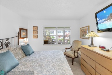 BEAUTIFULLY REMODELED, FIRST FLOOR 2 BEDROOM, 1.5 BATH CONDO on Hillsboro Pines Golf in Florida - for sale on GolfHomes.com, golf home, golf lot