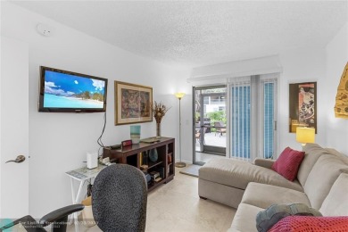 BEAUTIFULLY REMODELED, FIRST FLOOR 2 BEDROOM, 1.5 BATH CONDO on Hillsboro Pines Golf in Florida - for sale on GolfHomes.com, golf home, golf lot