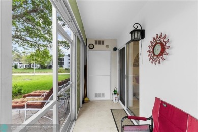 BEAUTIFULLY REMODELED, FIRST FLOOR 2 BEDROOM, 1.5 BATH CONDO on Hillsboro Pines Golf in Florida - for sale on GolfHomes.com, golf home, golf lot