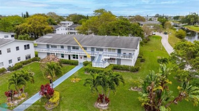 BEAUTIFULLY REMODELED, FIRST FLOOR 2 BEDROOM, 1.5 BATH CONDO on Hillsboro Pines Golf in Florida - for sale on GolfHomes.com, golf home, golf lot