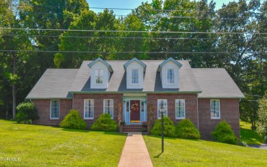 This gorgeous Cape Cod Colonial home is located in the heart of on Tri Cities Golf Club in Tennessee - for sale on GolfHomes.com, golf home, golf lot