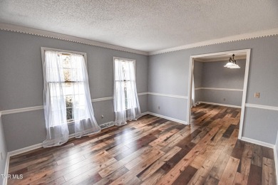 This gorgeous Cape Cod Colonial home is located in the heart of on Tri Cities Golf Club in Tennessee - for sale on GolfHomes.com, golf home, golf lot