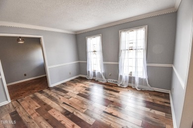 This gorgeous Cape Cod Colonial home is located in the heart of on Tri Cities Golf Club in Tennessee - for sale on GolfHomes.com, golf home, golf lot