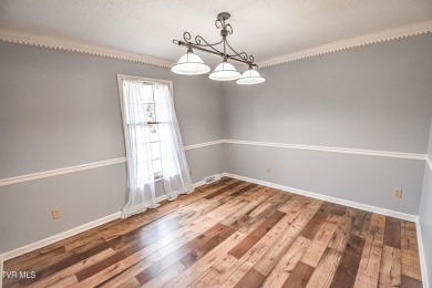 This gorgeous Cape Cod Colonial home is located in the heart of on Tri Cities Golf Club in Tennessee - for sale on GolfHomes.com, golf home, golf lot