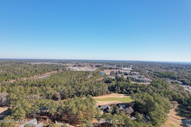 Nearly 1/2 an acre with golf and water view in Sea Trail! Ready on Sea Trail Golf Resort in North Carolina - for sale on GolfHomes.com, golf home, golf lot