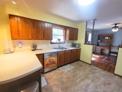 This well-kept ranch on Twin Lakes Golf Club in Arkansas - for sale on GolfHomes.com, golf home, golf lot