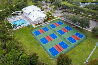 Rare corner-lot waterfront gem with wraparound water and golf on Savanna Golf Club in Florida - for sale on GolfHomes.com, golf home, golf lot