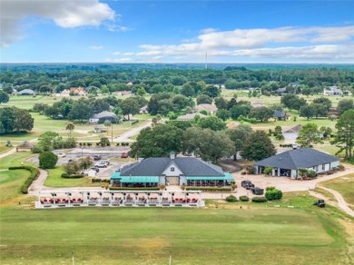 IN THE ESTATES OF BLACK BEAR RESERVE, A CHARMING HOME SITS ON on Black Bear Golf Club in Florida - for sale on GolfHomes.com, golf home, golf lot