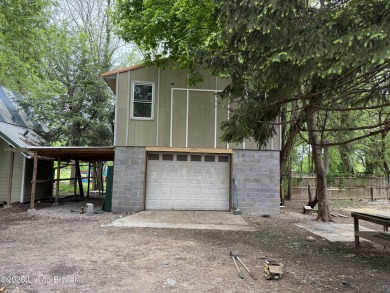 INVESTOR SPECIAL! Take note of double lot with 3 structures on Shawnee Golf Course in Kentucky - for sale on GolfHomes.com, golf home, golf lot