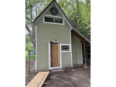 INVESTOR SPECIAL! Take note of double lot with 3 structures on Shawnee Golf Course in Kentucky - for sale on GolfHomes.com, golf home, golf lot
