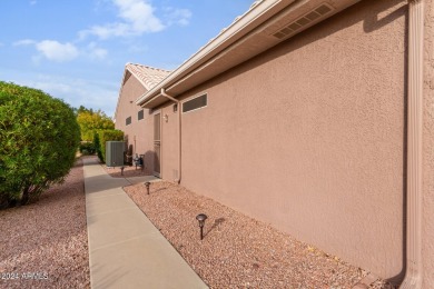 Pride of ownership! This charming 2-bedroom, 2-bath residence is on Desert Trails in Arizona - for sale on GolfHomes.com, golf home, golf lot