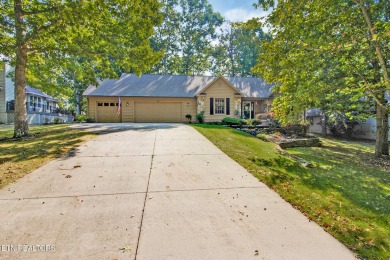 Garage door replaced. Exterior painting and back deck staining on Stonehenge Golf Course in Tennessee - for sale on GolfHomes.com, golf home, golf lot