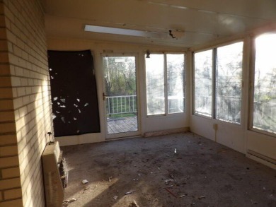 Over 2,252 square home  with four bedroom, three bath home on Lynx Golf Course in Michigan - for sale on GolfHomes.com, golf home, golf lot