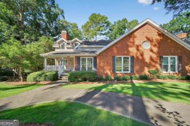 Charming Golf Cottage with Premier Location in Reynolds Lake on Reynolds Lake Oconee - The Oconee in Georgia - for sale on GolfHomes.com, golf home, golf lot