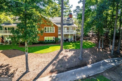Charming Golf Cottage with Premier Location in Reynolds Lake on Reynolds Lake Oconee - The Oconee in Georgia - for sale on GolfHomes.com, golf home, golf lot