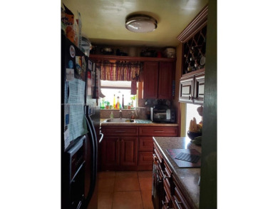 Beautiful 2 bedroom, 2 bath luxury condo with a scenic lake view on Sunrise Lakes Phase III in Florida - for sale on GolfHomes.com, golf home, golf lot