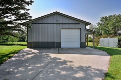 This beautifully maintained 3 bed, 2 bath home on the edge of on Rolling Oaks Golf Course in Wisconsin - for sale on GolfHomes.com, golf home, golf lot